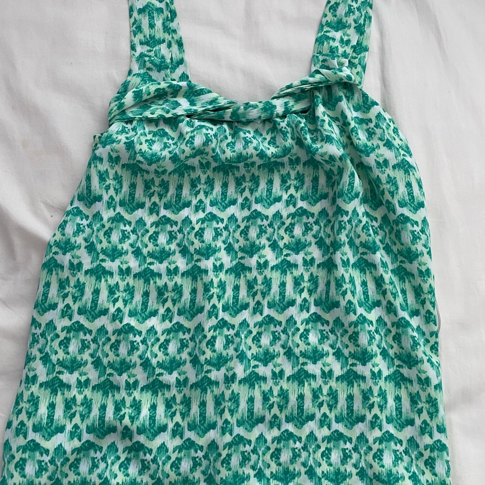 Green flowy tank top, with straps off the shoulder
